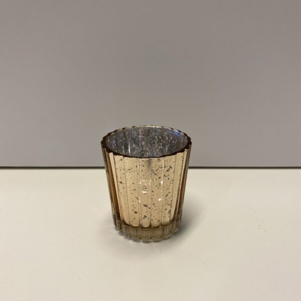 Rozā zelts stikla svečturis