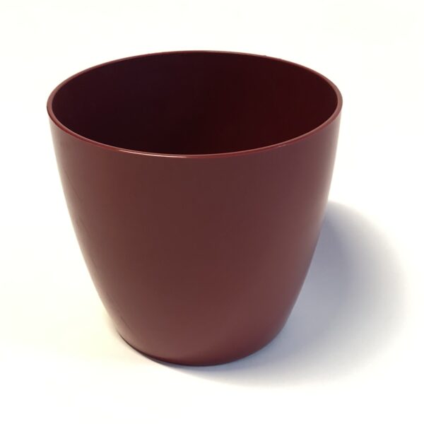 Sarkans plastmasas puķu pods.