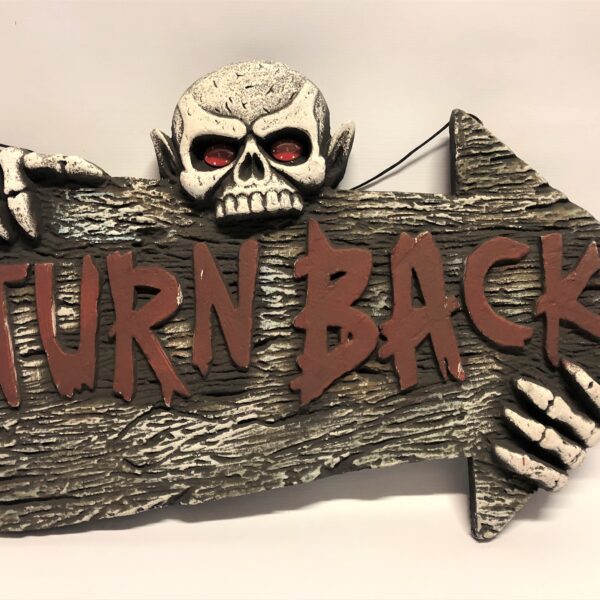 Dekoratīva zīme ar skeletu.